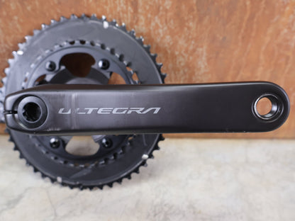 Kurbel von 4iiii, SHIMANO ULTEGRA FC - R8100 / 4IIII PRECISION POWERMETER KURBEL / 52 - 36 Z / 175 MM vor USEDBIKES - OB.DE Hintergrund