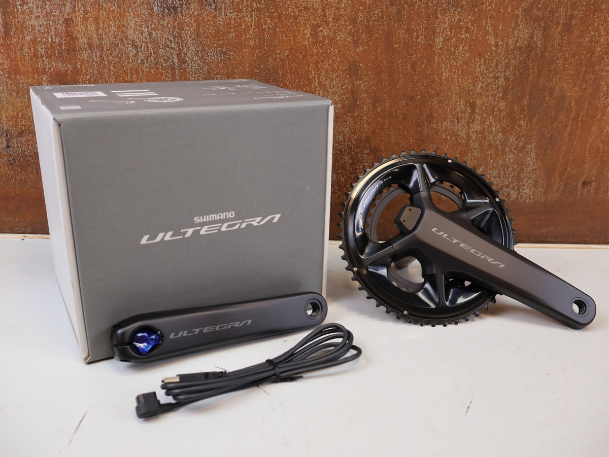 Kurbel von Shimano, Shimano Ultegra FC-R8100-P Powermeter Kurbel 170mm 50-34Z vor USEDBIKES-OB.DE Hintergrund