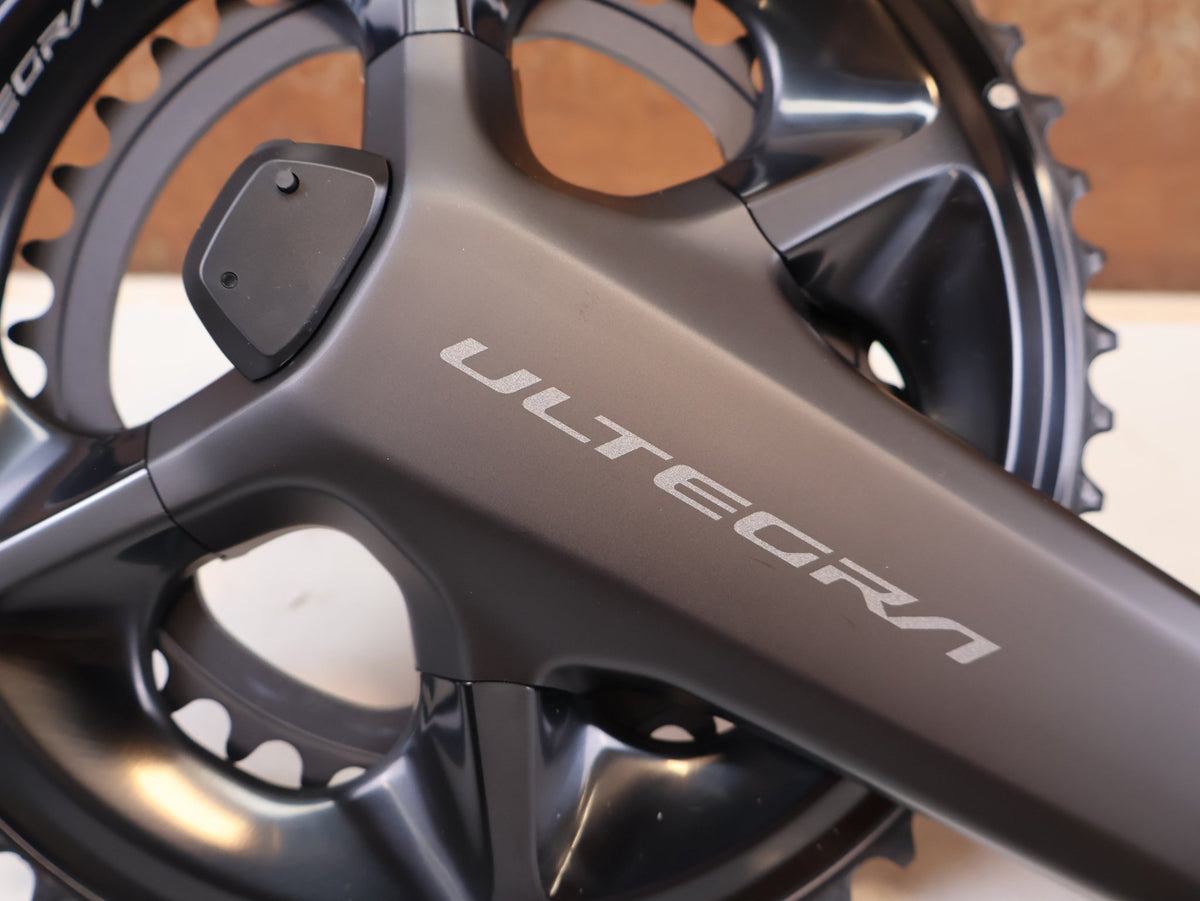 Kurbel von Shimano, Shimano Ultegra FC-R8100-P Powermeter Kurbel 170mm 50-34Z vor USEDBIKES-OB.DE Hintergrund