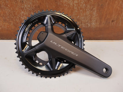 Kurbel von Shimano, Shimano Ultegra FC-R8100-P Powermeter Kurbel 170mm 50-34Z vor USEDBIKES-OB.DE Hintergrund