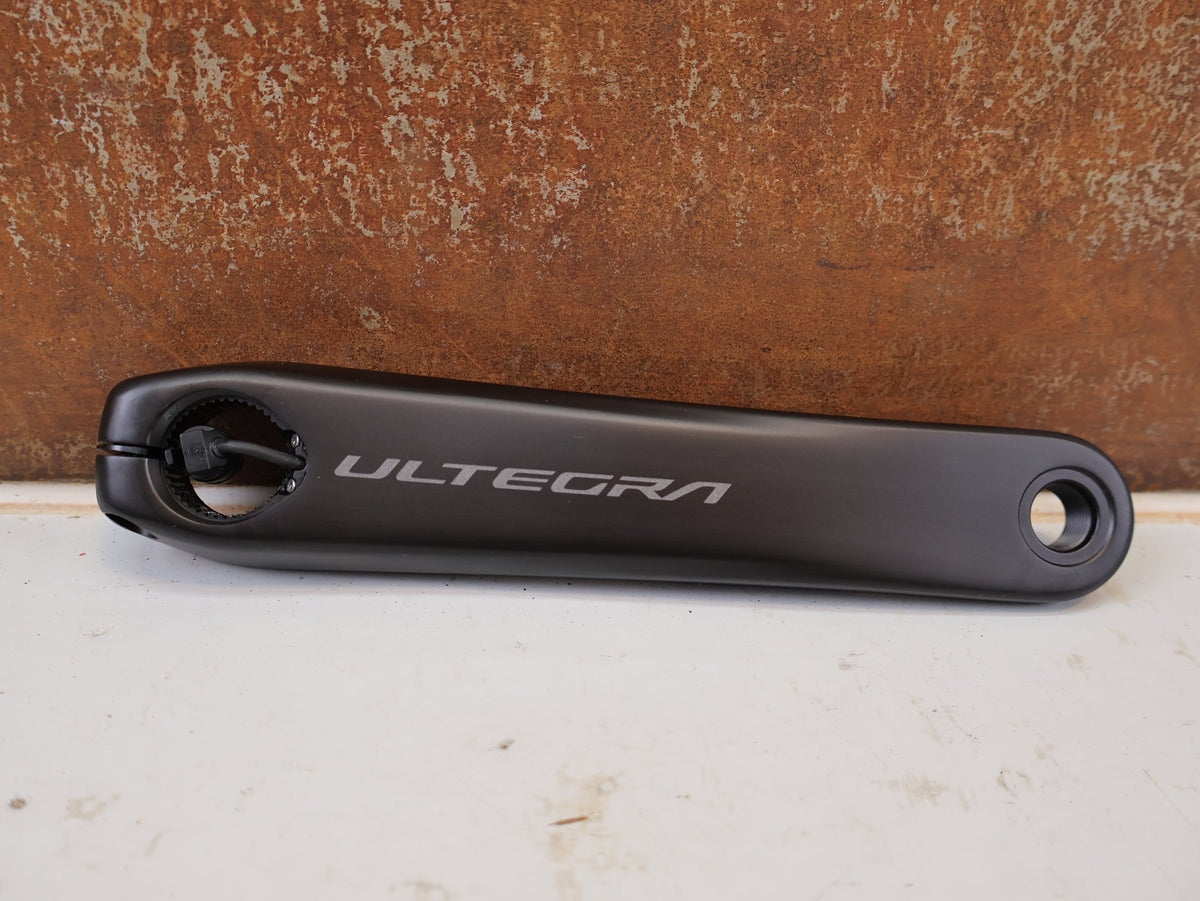 Kurbel von Shimano, Shimano Ultegra FC-R8100-P Powermeter Kurbel 172.5mm 50-34Z vor USEDBIKES-OB.DE Hintergrund