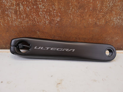 Kurbel von Shimano, Shimano Ultegra FC-R8100-P Powermeter Kurbel 172.5mm 50-34Z vor USEDBIKES-OB.DE Hintergrund