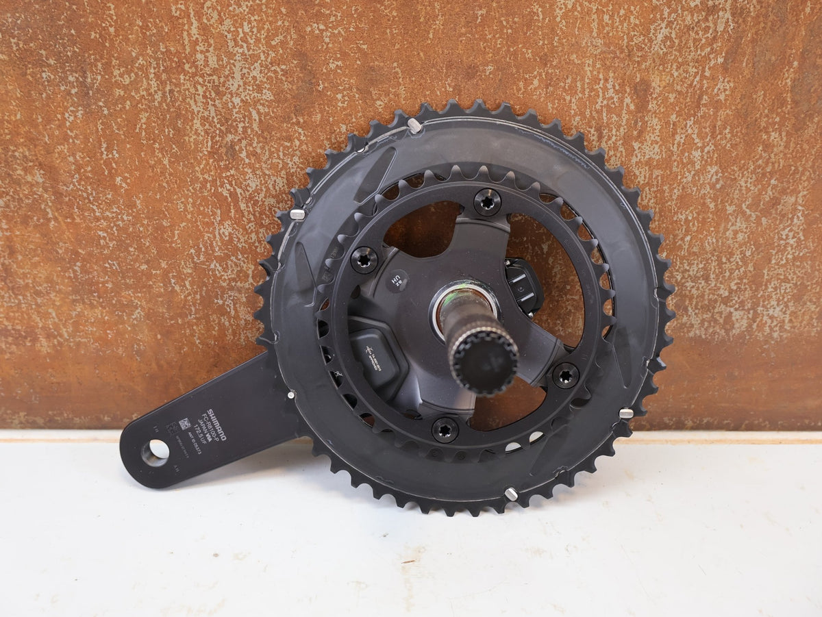 Kurbel von Shimano, Shimano Ultegra FC-R8100-P Powermeter Kurbel 172.5mm 50-34Z vor USEDBIKES-OB.DE Hintergrund