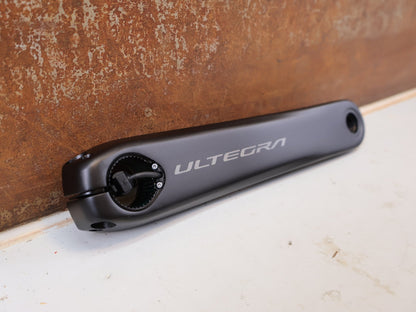 Kurbel von Shimano, Shimano Ultegra FC-R8100-P Powermeter Kurbel 172.5mm 50-34Z vor USEDBIKES-OB.DE Hintergrund