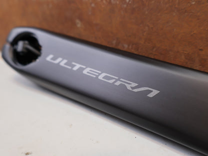 Kurbel von Shimano, Shimano Ultegra FC-R8100-P Powermeter Kurbel 172.5mm 50-34Z vor USEDBIKES-OB.DE Hintergrund