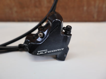 Schaltgruppen von Shimano, SHIMANO ULTEGRA R8050/8070 DI2 GRUPPE / 2X11 - FACH / SS - SCHALTWERK / DISC vor USEDBIKES - OB.DE Hintergrund