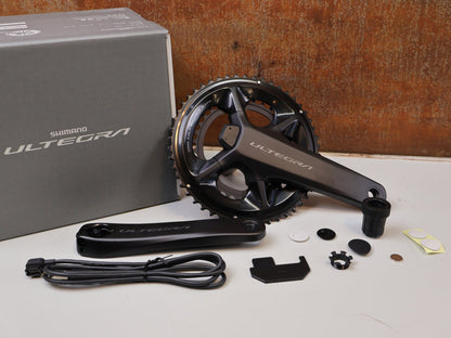 Schaltgruppen von Shimano, SHIMANO ULTEGRA R8100 POWERMETER GRUPPE 165MM 50-34 11-34 12F vor USEDBIKES-OB.DE Hintergrund