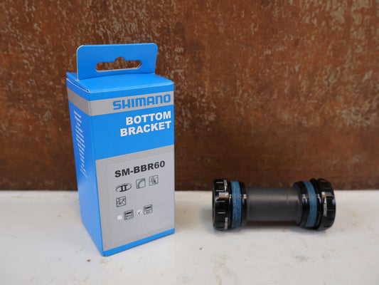 Innenlager von Shimano, Shimano Ultegra SM-BBR60 ITA Innenlager ISMBBR60I vor USEDBIKES-OB.DE Hintergrund