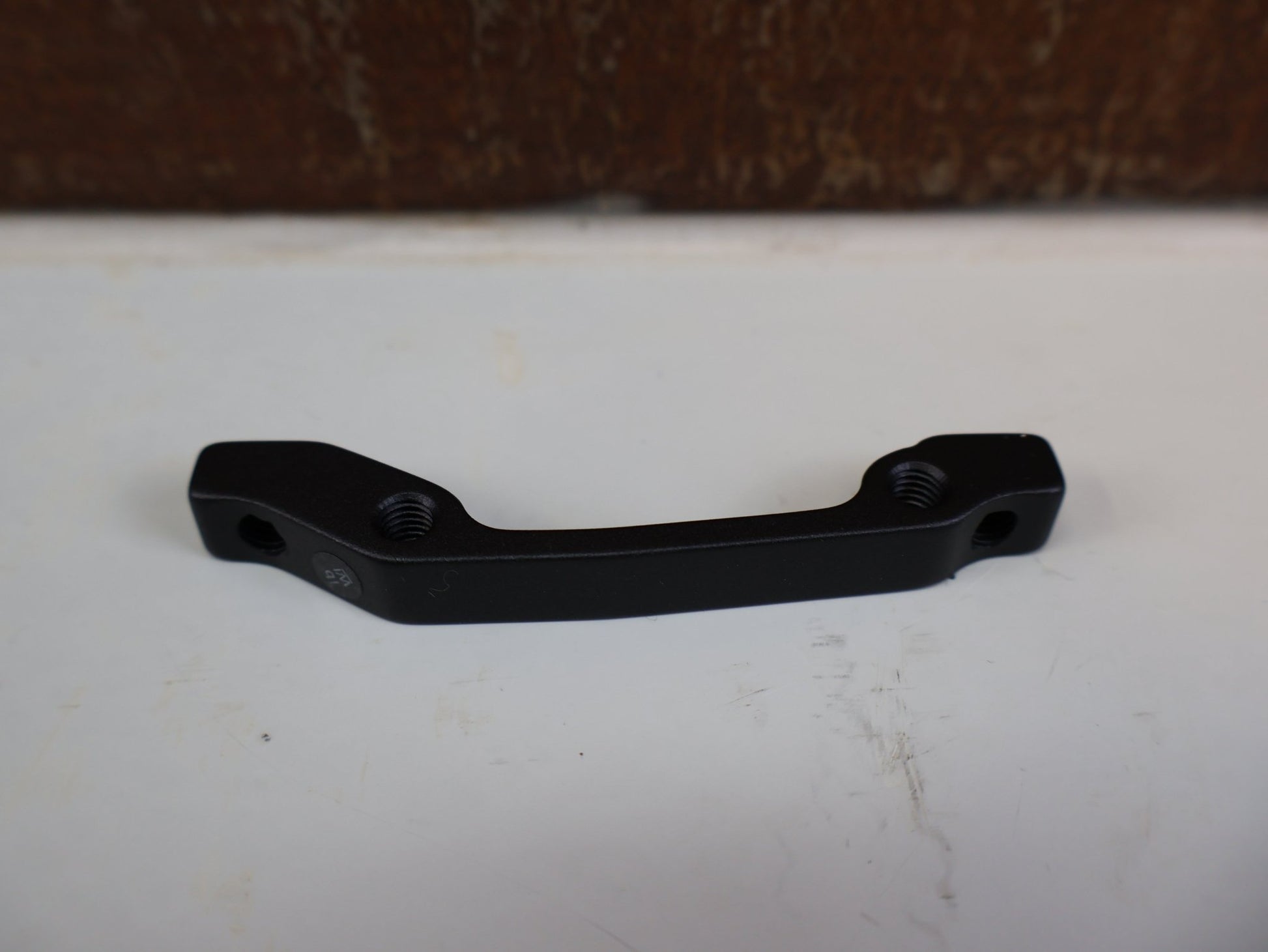 Bremsadapter von Shimano, SHIMANO XTR ADAPTER SM-MA90-F160P/S / VR 160 MM vor USEDBIKES-OB.DE Hintergrund
