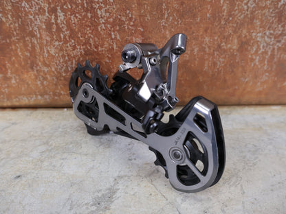 Kurbel von Shimano, SHIMANO XTR RD - M9120 - SGS SCHALTWERK / 12 - FACH – SHADOW+ / LANGER KÄFIG – 10–45 Z vor USEDBIKES - OB.DE Hintergrund