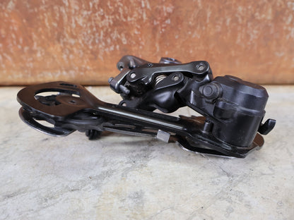 Kurbel von Shimano, SHIMANO XTR RD - M9120 - SGS SCHALTWERK / 12 - FACH – SHADOW+ / LANGER KÄFIG – 10–45 Z vor USEDBIKES - OB.DE Hintergrund