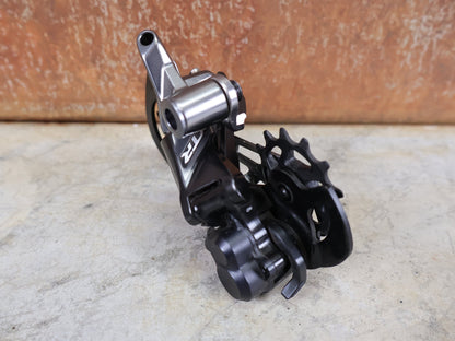 Kurbel von Shimano, SHIMANO XTR RD - M9120 - SGS SCHALTWERK / 12 - FACH – SHADOW+ / LANGER KÄFIG – 10–45 Z vor USEDBIKES - OB.DE Hintergrund