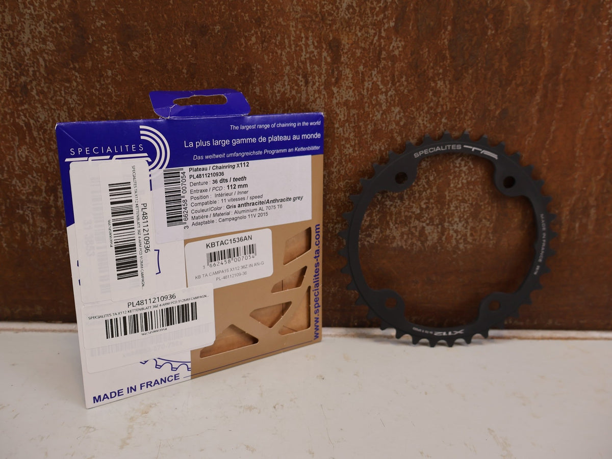 Kettenblatt von Specialites T.A., SPECIALITES TA X112 KETTENBLATT 36Z 4-ARM PCD 112MM CAMPAGNOLO 11F vor USEDBIKES-OB.DE Hintergrund