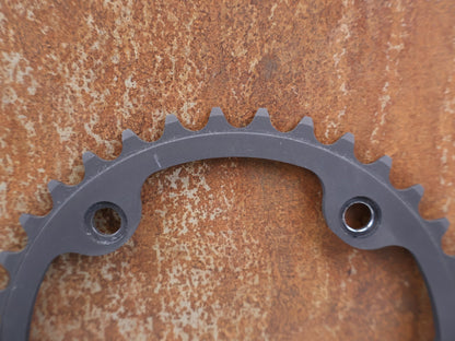 Kettenblatt von Specialites T.A., SPECIALITES TA X112 KETTENBLATT 36Z 4-ARM PCD 112MM CAMPAGNOLO 11F vor USEDBIKES-OB.DE Hintergrund