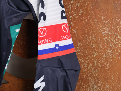 Anzug - BOH von Specialized, SPECIALIZED RED BULL - BORA HANSGROHE AERO SKIN SUIT LS ROGLIČ / LANGARM EINTEILER vor USEDBIKES - OB.DE Hintergrund