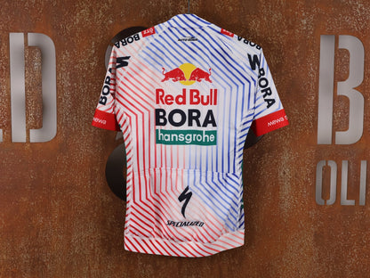 Kurzarm Trikot - BOH von Specialized, SPECIALIZED RED BULL - BORA HANSGROHE REPLICA JERSEY SS TDF / KURZARM TRIKOT vor USEDBIKES - OB.DE Hintergrund