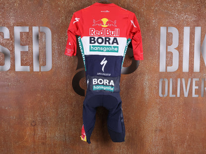 Anzug - BOH von Specialized, SPECIALIZED RED BULL - BORA HANSGROHE ROAD SKIN SUIT SS / NETHERLANDS CHAMPION vor USEDBIKES - OB.DE Hintergrund
