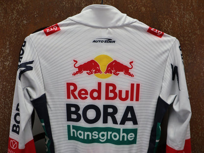 Langarm Trikot - BOH von Specialized, SPECIALIZED RED BULL - BORA HANSGROHE THERMAL JERSEY LS / LANGARM TRIKOT vor USEDBIKES - OB.DE Hintergrund