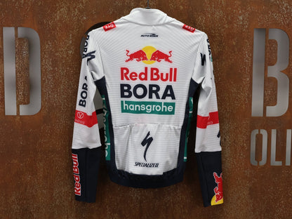 Langarm Trikot - BOH von Specialized, SPECIALIZED RED BULL - BORA HANSGROHE THERMAL JERSEY LS / LANGARM TRIKOT vor USEDBIKES - OB.DE Hintergrund