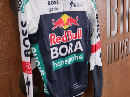 Langarm Trikot - BOH von Specialized, SPECIALIZED RED BULL - BORA HANSGROHE THERMAL JERSEY LS / LANGARM TRIKOT U23 vor USEDBIKES - OB.DE Hintergrund