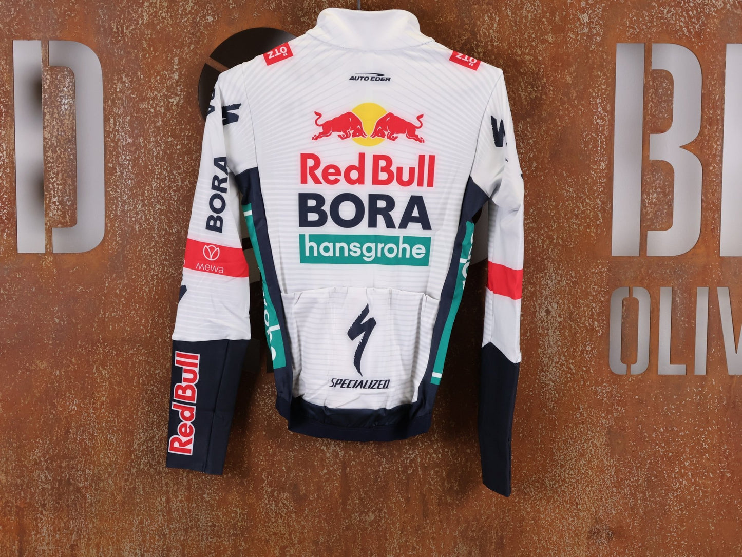 Langarm Trikot - BOH von Specialized, SPECIALIZED RED BULL - BORA HANSGROHE THERMAL JERSEY LS / LANGARM TRIKOT U23 vor USEDBIKES - OB.DE Hintergrund