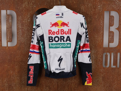 Langarm Trikot - BOH von Specialized, SPECIALIZED RED BULL - BORA HANSGROHE THERMAL JERSEY LS ROGLIČ / LANGARM TRIKOT vor USEDBIKES - OB.DE Hintergrund
