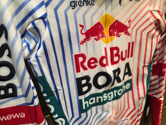 Langarm Trikot - BOH von Specialized, SPECIALIZED RED BULL - BORA HANSGROHE THERMAL JERSEY LS TDF / LANGARM TRIKOT vor USEDBIKES - OB.DE Hintergrund