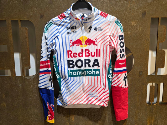 Langarm Trikot - BOH von Specialized, SPECIALIZED RED BULL - BORA HANSGROHE THERMAL JERSEY LS TDF / ROGLIC vor USEDBIKES - OB.DE Hintergrund