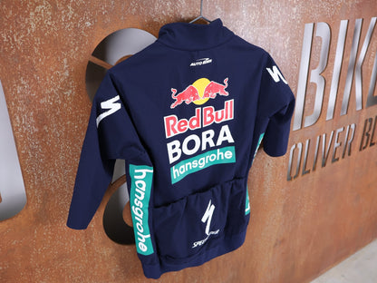 Regenbekleidung - BOH von Specialized, SPECIALIZED RED BULL - BORA HANSGROHE WET WEATHER JERSEY SS / KURZARM THERMAL RENNTRIKOT vor USEDBIKES - OB.DE Hintergrund