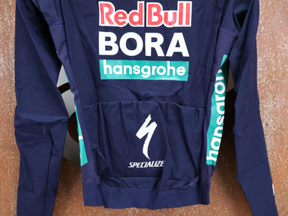 Regenbekleidung - BOH von Specialized, SPECIALIZED RED BULL - BORA HANSGROHEWET WEATHER JERSEY LS / LANGARM THERMAL RENNTRIKOT vor USEDBIKES - OB.DE Hintergrund