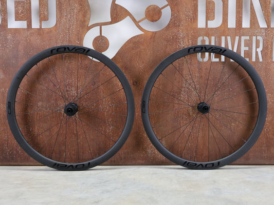 Laufrad/Laufradsatz von Specialized, SPECIALIZED ROVAL RAPIDE C38 LAUFRADSATZ DISC vor USEDBIKES - OB.DE Hintergrund