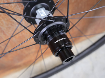 Laufrad/Laufradsatz von Specialized, SPECIALIZED ROVAL RAPIDE C38 LAUFRADSATZ DISC vor USEDBIKES - OB.DE Hintergrund