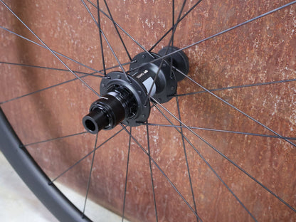 Laufrad/Laufradsatz von Specialized, SPECIALIZED ROVAL RAPIDE C38 LAUFRADSATZ DISC vor USEDBIKES - OB.DE Hintergrund