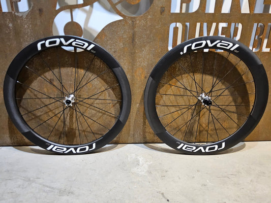 Laufrad/Laufradsatz von Specialized, SPECIALIZED ROVAL RAPIDE CLX II TEAM EDITION LAUFRADSATZ DISC vor USEDBIKES - OB.DE Hintergrund