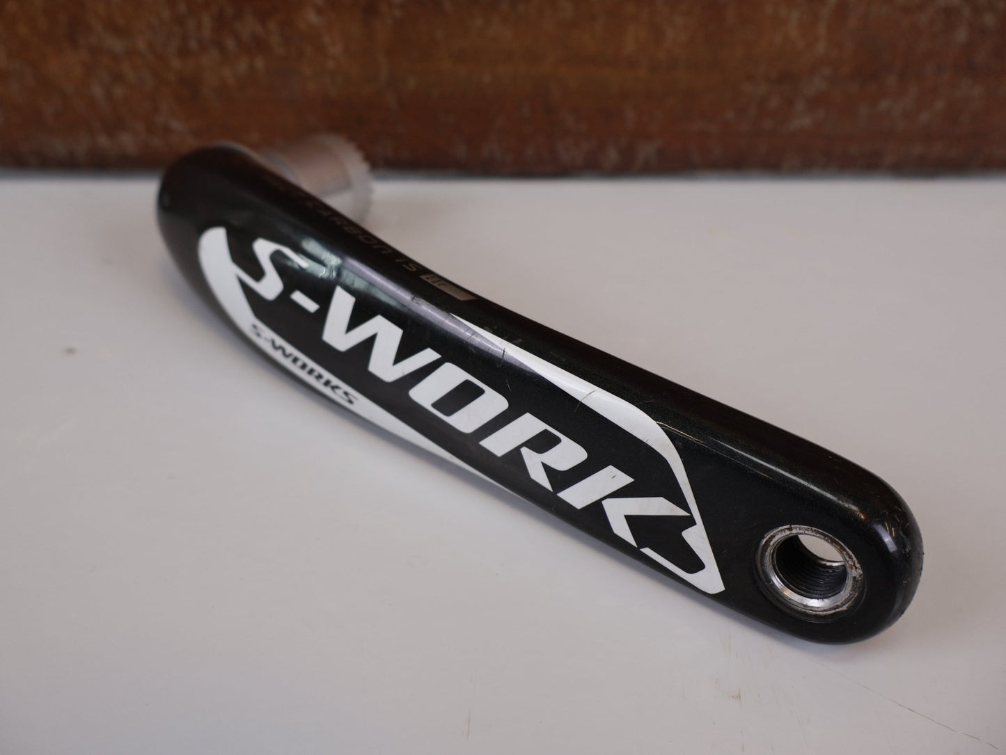 Kurbel von Specilaized, SPECIALIZED S - WORKS FACT CARBON KURBELARME 175 MM – 338 G / OSBB PF30 BB30 vor USEDBIKES - OB.DE Hintergrund