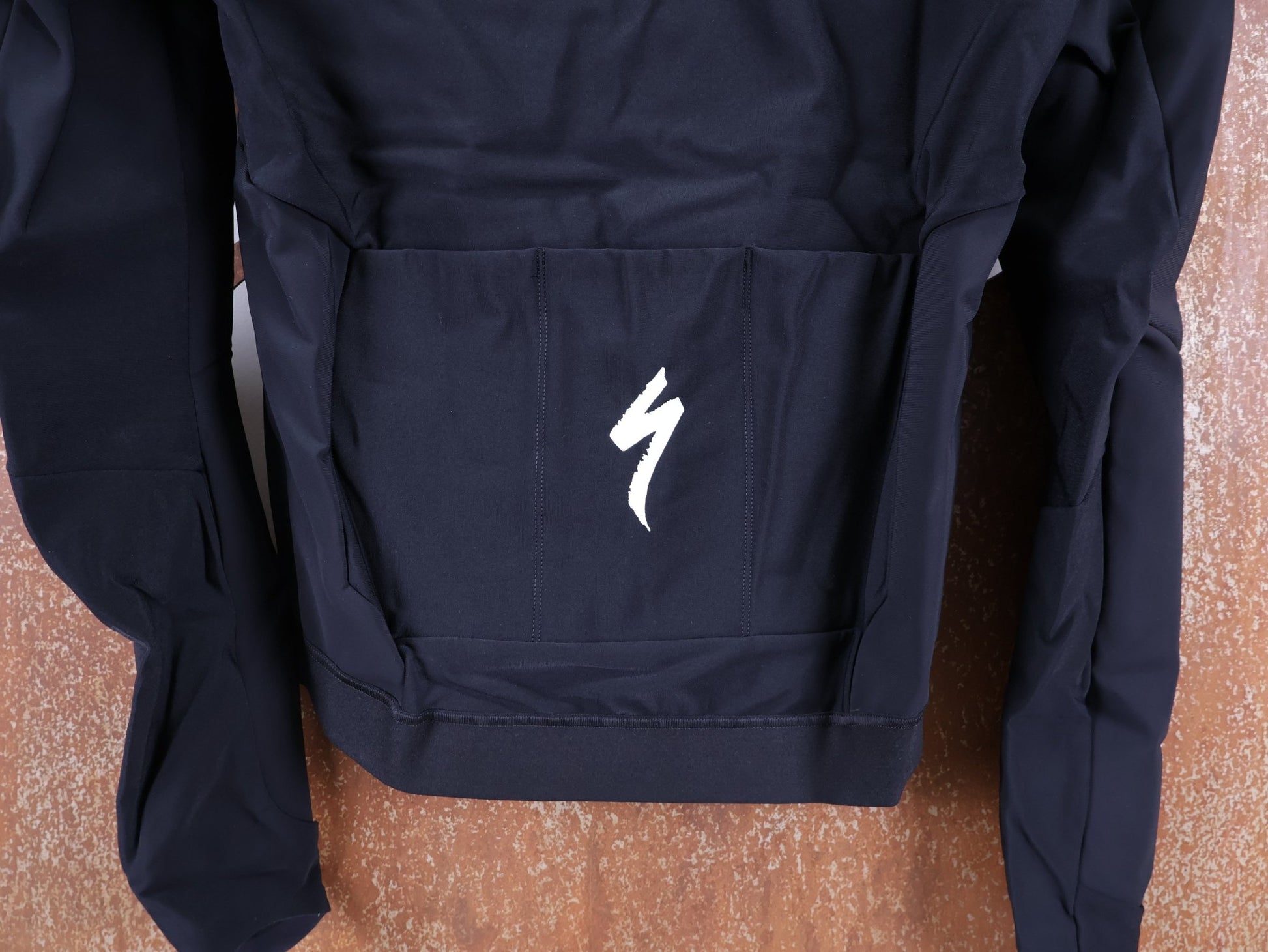 Langarm Trikot - BOH von Specialized, SPECIALIZED S - WORKS INSULATED SOFTSHELL JACKET / WINTERJACKE vor USEDBIKES - OB.DE Hintergrund