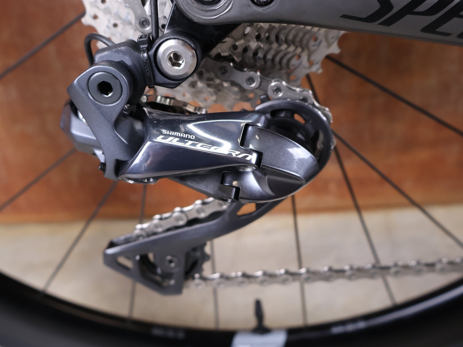 Rennrad von Specialized, SPECIALIZED TARMAC SL7 EXPERT UDI2 / SHIMANO ULTEGRA DI2 – DT SWISS ARC 1600 45 MM – GRÖSSE 52 CM vor USEDBIKES - OB.DE Hintergrund