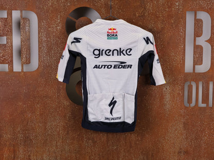 Kurzarm Trikot - BOH von Specialized, SPECIALIZED TGA ROOKIES OF RED BULL - BORA HANSGROHE RACE JERSEY SS / KURZARM TRIKOT vor USEDBIKES - OB.DE Hintergrund