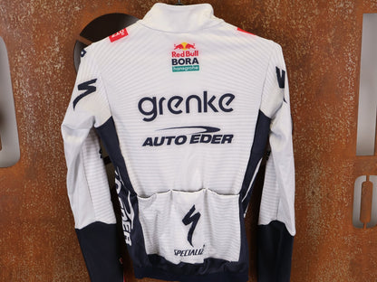 Langarm Trikot - BOH von Specialized, SPECIALIZED TGA ROOKIES OF RED BULL - BORA HANSGROHE THERMAL JERSEY LS / LANGARM TRIKOT vor USEDBIKES - OB.DE Hintergrund