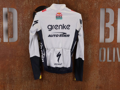 Langarm Trikot - BOH von Specialized, SPECIALIZED TGA ROOKIES OF RED BULL - BORA HANSGROHE THERMAL JERSEY LS / LANGARM TRIKOT vor USEDBIKES - OB.DE Hintergrund