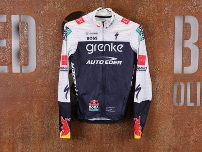 Langarm Trikot - BOH von Specialized, SPECIALIZED TGA ROOKIES OF RED BULL - BORA HANSGROHE THERMAL JERSEY LS / LANGARM TRIKOT vor USEDBIKES - OB.DE Hintergrund