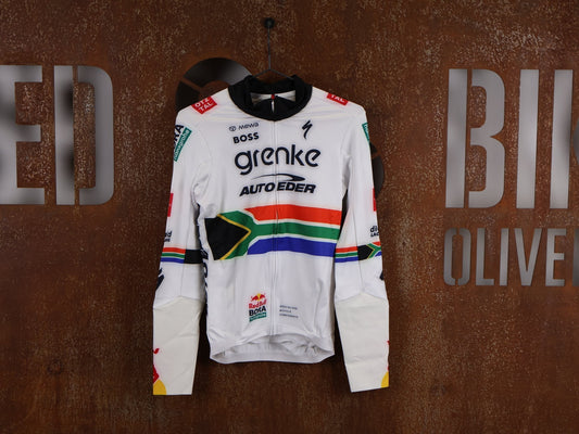 Langarm Trikot - BOH von Specialized, SPECIALIZED TGA ROOKIES OF RED BULL - BORA HANSGROHE THERMAL JERSEY LS / SOUTH AFRICA CHAMPION vor USEDBIKES - OB.DE Hintergrund