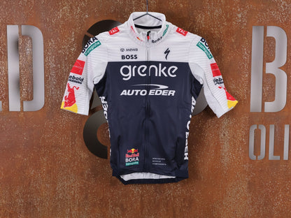 Langarm Trikot - BOH von Specialized, SPECIALIZED TGA ROOKIES OF RED BULL - BORA HANSGROHE THERMAL JERSEY SS / KURZARM TRIKOT vor USEDBIKES - OB.DE Hintergrund