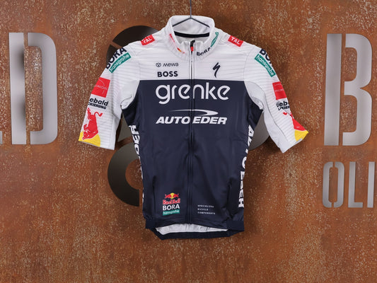 Langarm Trikot - BOH von Specialized, SPECIALIZED TGA ROOKIES OF RED BULL - BORA HANSGROHE THERMAL JERSEY SS / KURZARM TRIKOT vor USEDBIKES - OB.DE Hintergrund