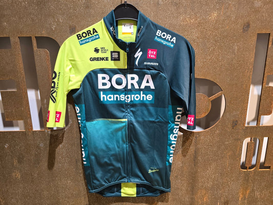 Kurzarm Trikot - BOH von Sportful, SPORTFUL BORA HANSGROHE MID SEASON JERSEY / WARMES KURZARM TRIKOT in variant_title vor USEDBIKES - OB.DE Hintergrund