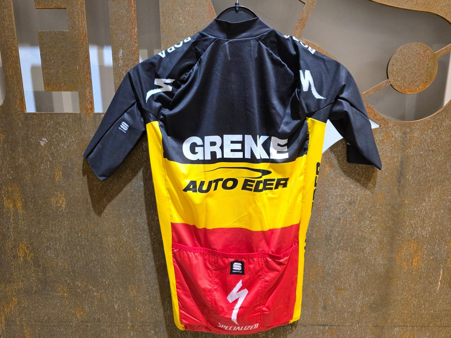 Kurzarm Trikot - U19 von Sportful, SPORTFUL GRENKE - AUTO EDER BOMBER JERSEY / KURZARM TRIKOT / BELGISCHER MEISTER in variant_title vor USEDBIKES - OB.DE Hintergrund