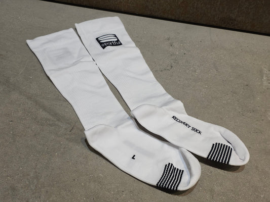 Zubehör - BOH von Sportful, SPORTFUL RED BULL - BORA HANSGROHE BOH RECOVERY SOCKS / SOCKEN UNISEX in variant_title vor USEDBIKES - OB.DE Hintergrund