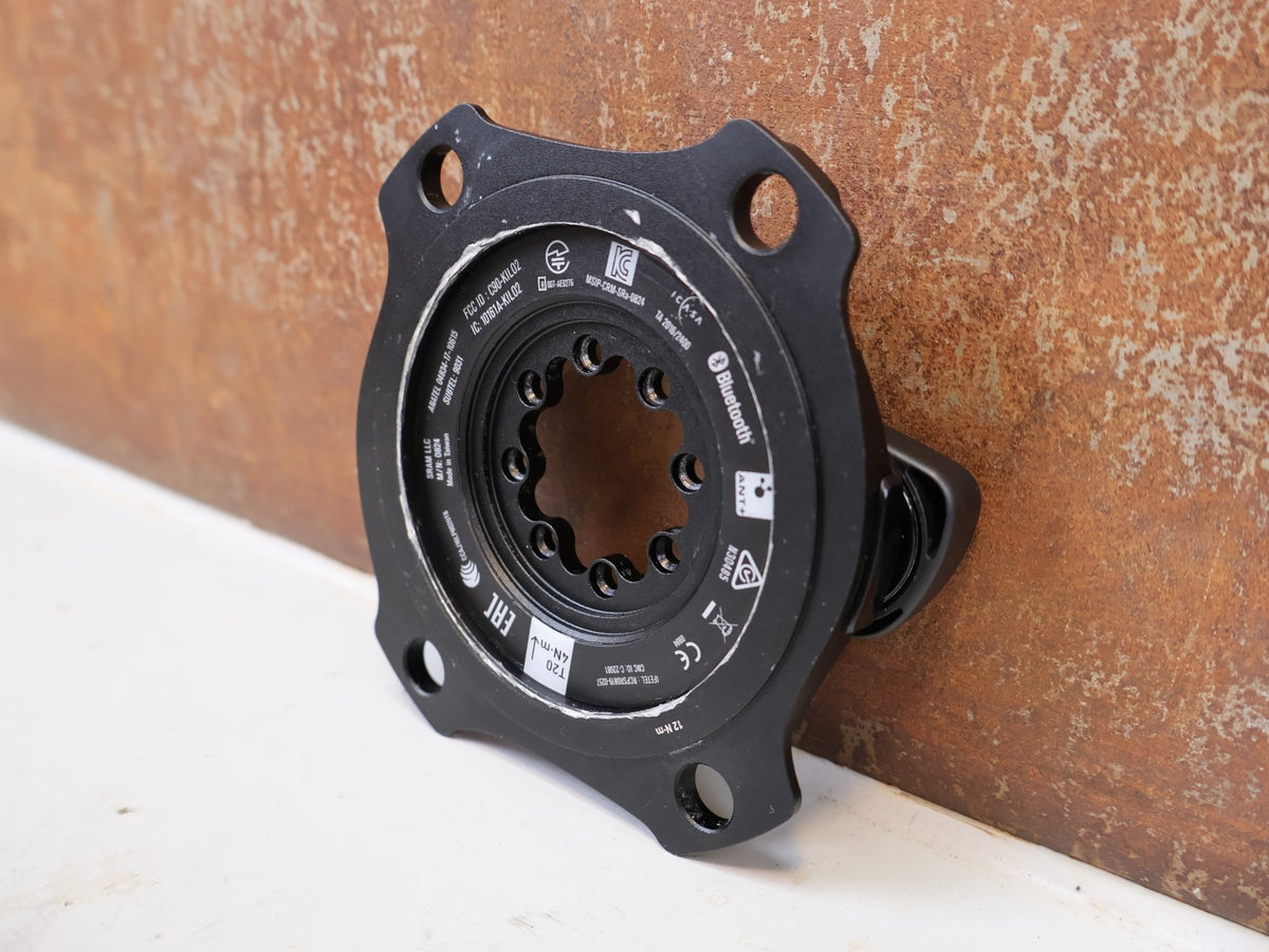 Powermeter von Sram, SRAM AXS Powermeter Spider 107 BCD 8-Bolt D1 vor USEDBIKES-OB.DE Hintergrund