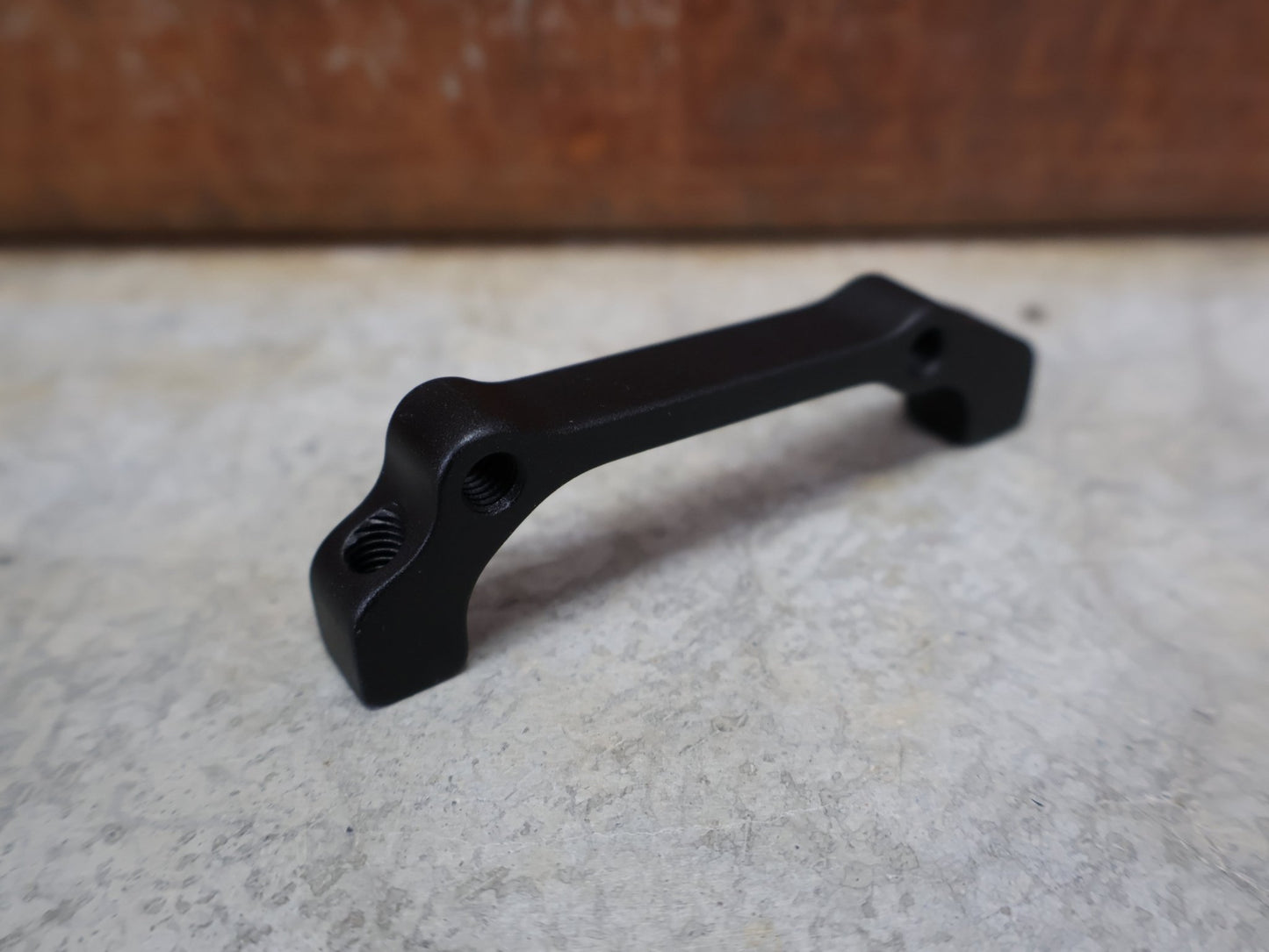 Zubehör von Sram, SRAM BREMSADAPTER +20 IS AUF PM FÜR VR 180 MM / HR 160 MM – 00.5318.009.001 vor USEDBIKES - OB.DE Hintergrund