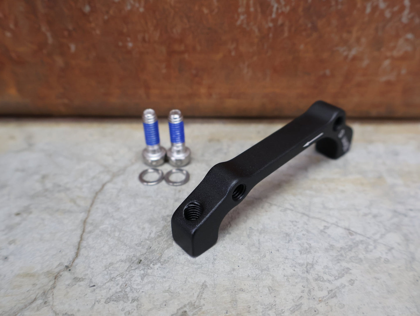 Zubehör von Sram, SRAM BREMSADAPTER +20 IS AUF PM FÜR VR 180 MM / HR 160 MM – 00.5318.009.001 vor USEDBIKES - OB.DE Hintergrund